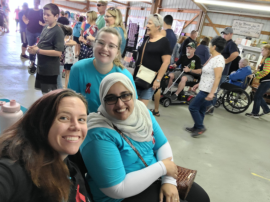 Two residents at volunteer function